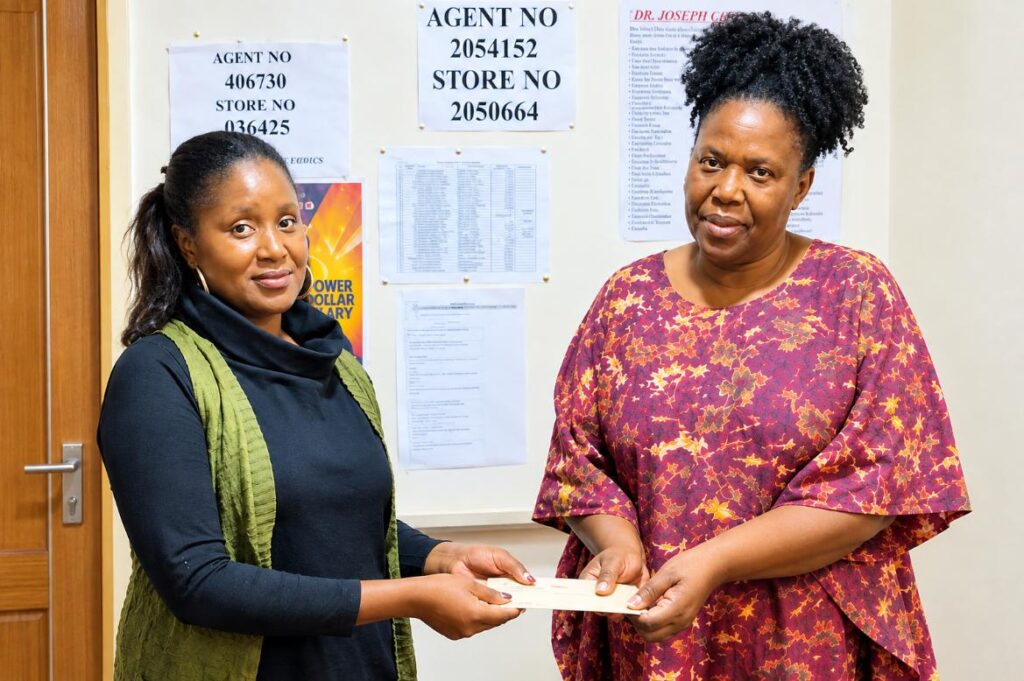 Inua Women CBO receiving cheque confirmation